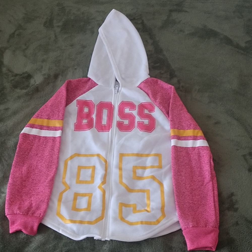A yellow, pink, and white jacket